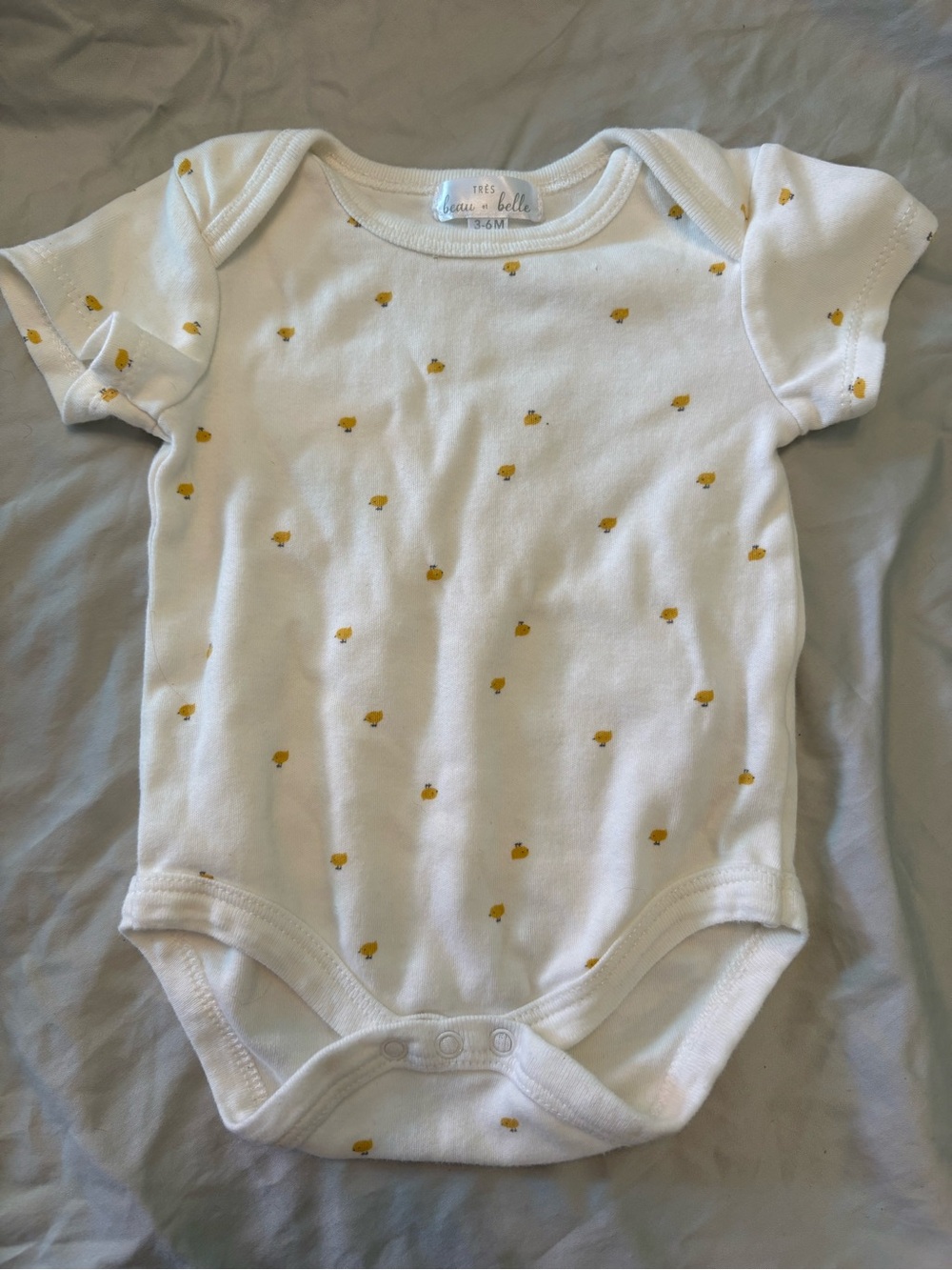 Tres Beau et Belle White Baby Onesie with Chick Print
